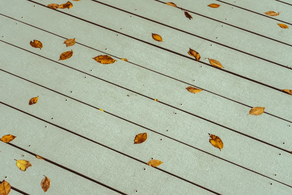 Composite deck boards in soft green